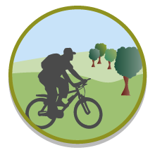 Pictogram van groene recreatie. Fietser met rugzak en vier loofbomen op achtergrond